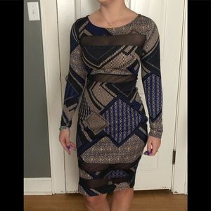 Multicolored dress with mesh cutouts.